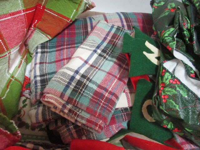 Grouping of Christmas Tablecloths, Aprons, and Linens - 4