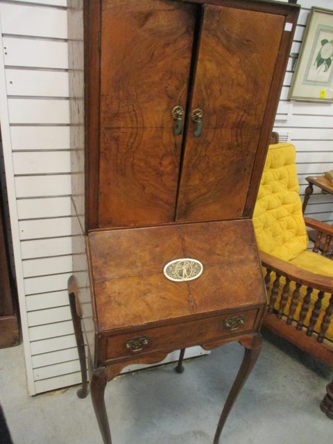 Antique English Fall Front Secretary Desk: 20 1/2" x 18" x 61", carved bone Serenade Scene emblem, butt joint drawer, cabriole legs, one door is warped, some veneer damage and scratches, See all pictures and preview for condition, Local Pickup