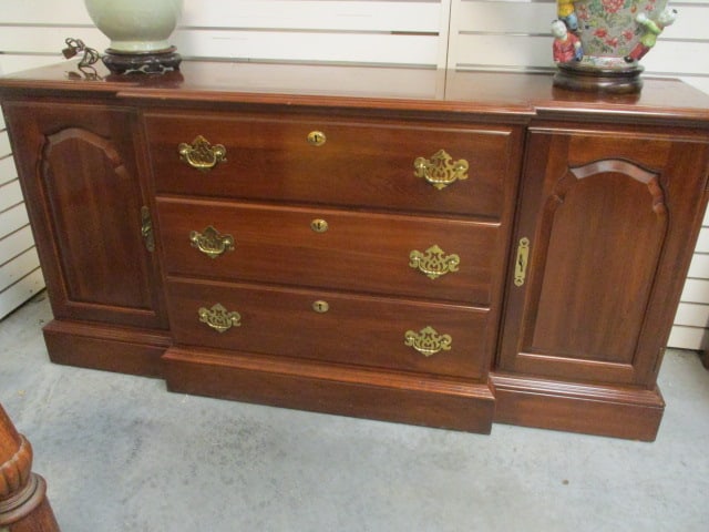 Kling Mahogany Breakfront Server with Raised Panel Doors and Doors: 82 1/2" x 18 1/4" x 30 1/2", break front has three dovetail drawers, removable flatware tray, door ends each have one adjustable shelf, brass hardware, few small scuffs on top, Local Pickup Only