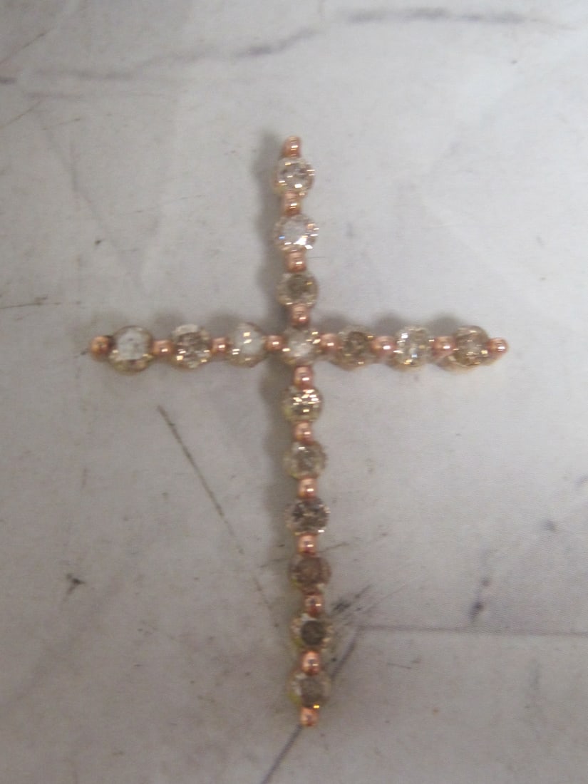 10k Rose Gold Diamond Cross Pendant: 16 round fancy champagne color diamonds totalling 1 carat, Appraised at $875, See Appraisal Photos for Specs