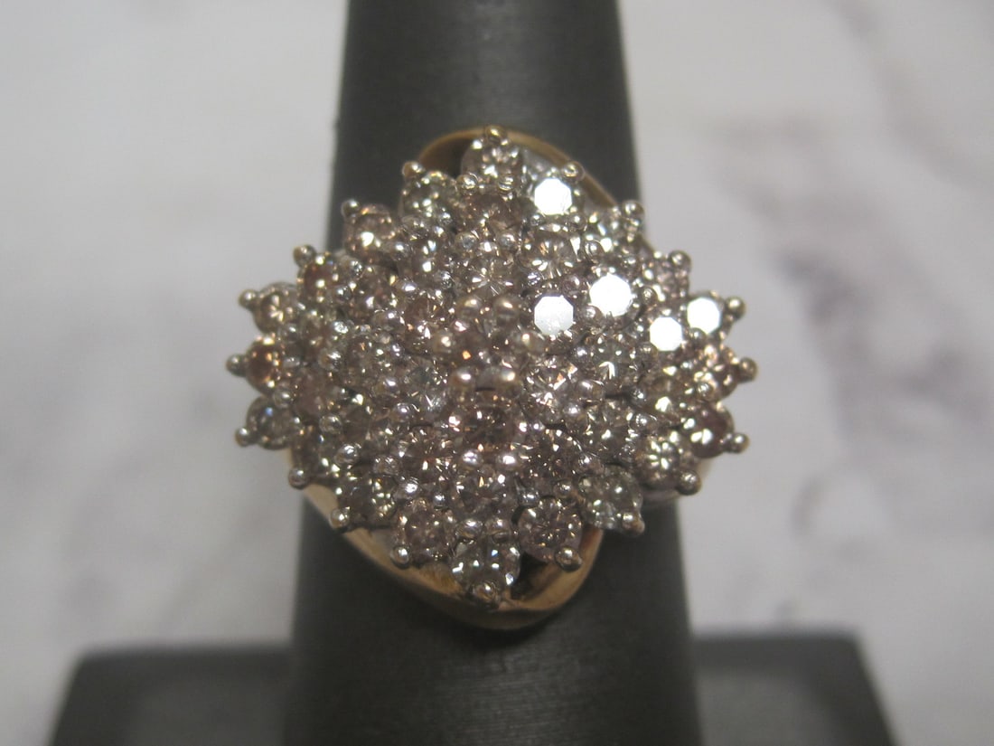 14k Gold Diamond Ring: 43 round diamonds totalling 2 carats, fancy champagne color, Size 7, Appraised at $3250, See Appraisal Photos for Specs