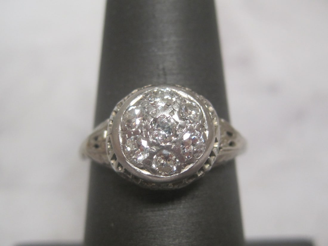 Antique 18k Gold Diamond Filigree White Gold Ring: 18k Gold Ring with new 14k Gold Shank for Strength, 7 round diamonds totalling .50 carat, high grade, Size 7 1/4. Appraised at $1550. See Appraisal Photos for Specs