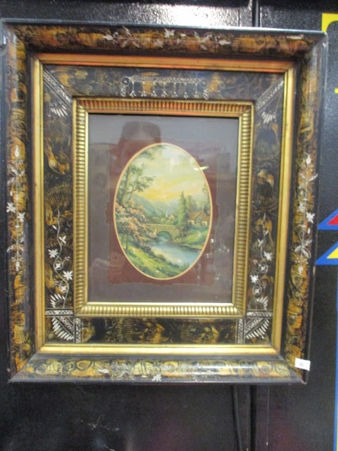 Vintage Country Village Landscape Lithograph in Black Ebonized Hand Decorated Frame: 14 1/2" x 16 1/2", lithograph has age damage see pictures and preview