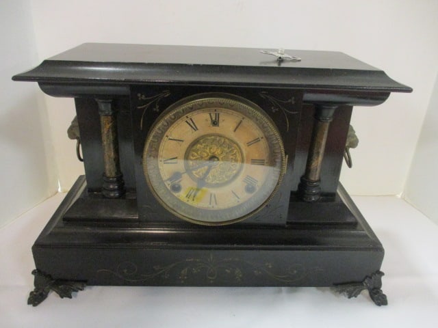 Antique Ebonized Mantle Clock Pillar & Scroll w/Lion Head Ring Handles: 16 1/2" x 7" x 10 3/4", has pendulum and key, will wind, tick and chime