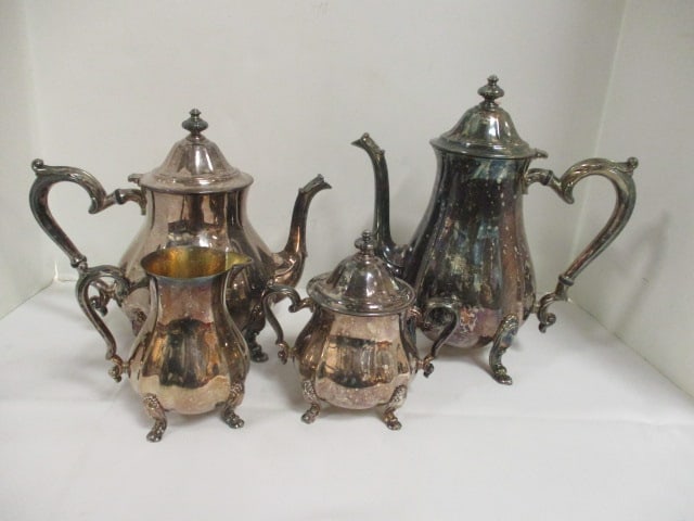 Oneida Silverplate Coffee and Tea Service: Coffee pot 10 1/2"h, teapot 8 1/2"h, creamer 5"h, lidded sugar bowl 6"h