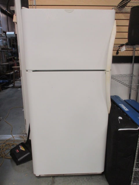 Frigidaire White Top Mount Refrigerator: 30 1/2" x 30"(32" including handles) x 66 3/4", Model FRT18S6AWH, Serial #BA44531641, DOM 11/04, needs cleaning, plugged in and cooling, Local Pickup Only