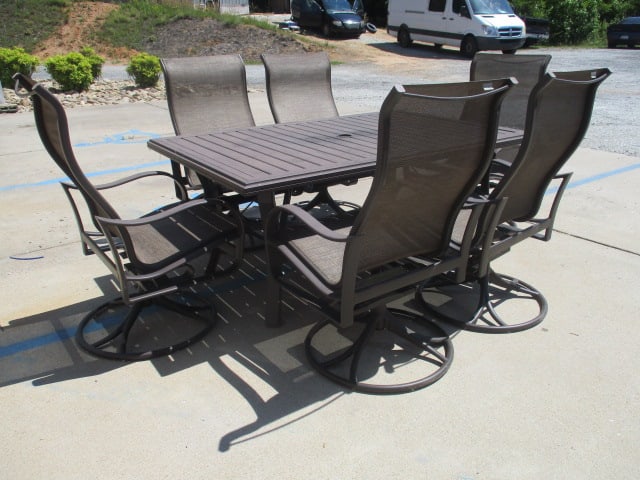Tropitone Bronzed Metal Frame Patio Set: 66" x 42" x 28 1/2" Umbrella table, (6)24 1/2"w Swiveling high back bouncy armchairs, Local Pickup Only