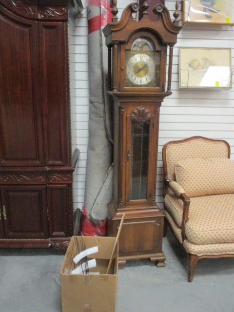 1970's Howard Miller Model 4898 Triple Chime Weight Driven Grandfather Clock: 18 1/2" x 12 1/2" x 79 1/2"(tip of finial), clock has weights and pendulum, chime rods, weights and pendulum were removed for transport-appears to be all there, identification label reads No. 155