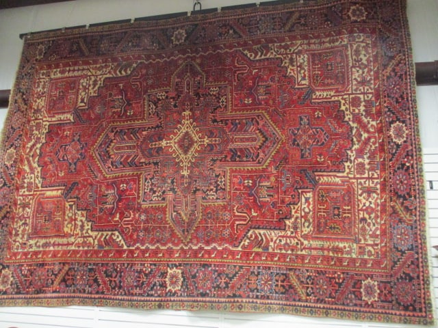 Hand Knotted Persian Heriz Wool Area Rug: 9'-8" x 14', Geometric central medallion design, Navy, Red and Ivory color palette, Local Pickup Only