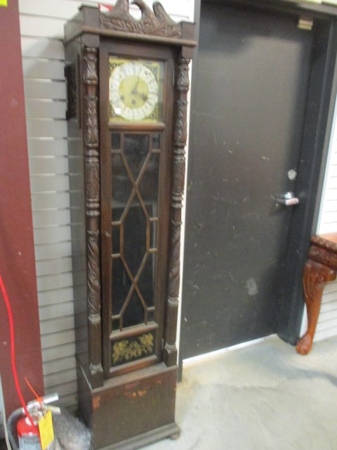 Antique Colonial Mfg. Co. Federal Colonial Revival Tall Case Clock: 18 1/2" x 13" x 77", Movement marked 13345 Winternaioon Germany, weights and pendulum were removed for transport, appears to have had top edge finials at one time, Does not have winding key, case