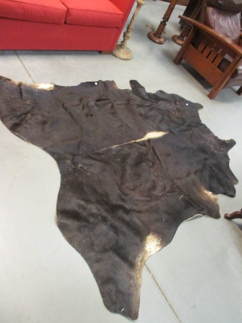 IKEA Koldby Ebony Brown Cowhide Rug: approx. 7' x 8', has IKEA label on back, marked #19025 602.229.32