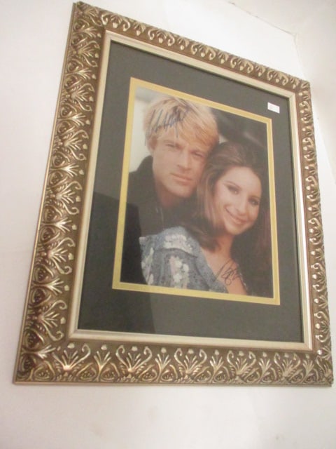"The Way We Were" Motion Picture Photo Signed by Robert Redford and Barbara Streisand: Framed and matted 14 1/2" x 17 1/2", Robert Redford signed in blue marker and Barbara Streisand signed in black marker. Signatures unauthenticated-see pictures and preview to make own determination