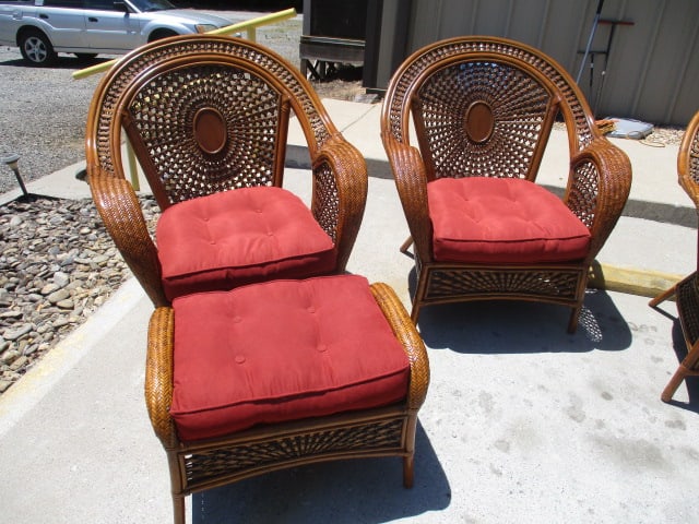 Pair of Ratan Arm Chairs and One Ottoman/Table with Woven Sunburst Design: (2)34"w arm chairs with removable burgundy cushion, ottoman/table 27" x 19 1/2" x 18 1/2", Local Pickup Only