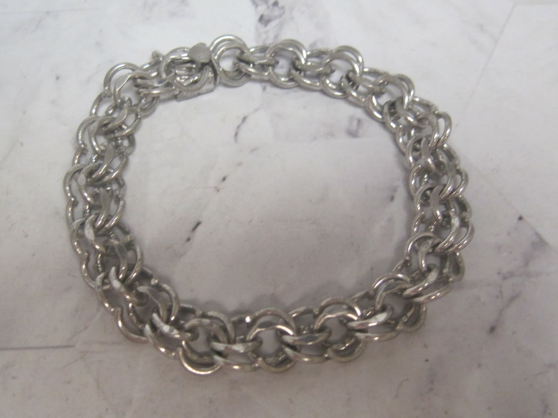 8" Sterling Silver Charm Bracelet: Weighs 22 grams