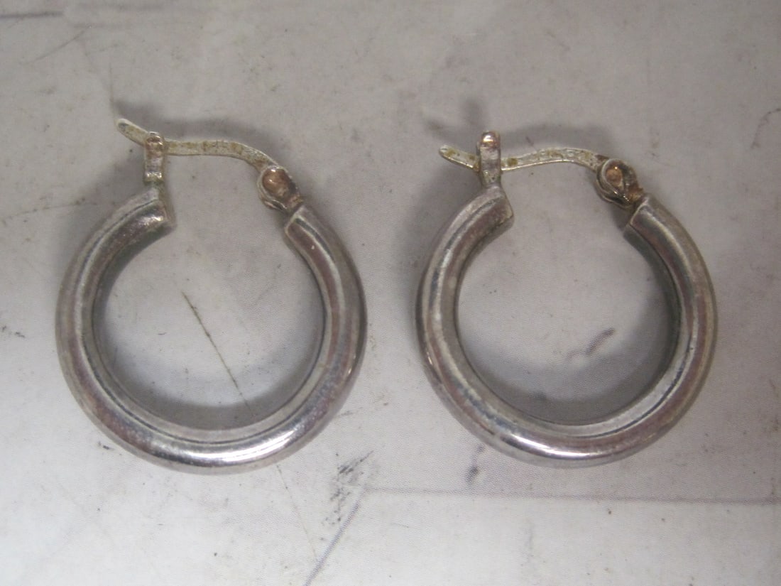 Sterling Silver Hoop Earrings: Weighs 3.2 grams