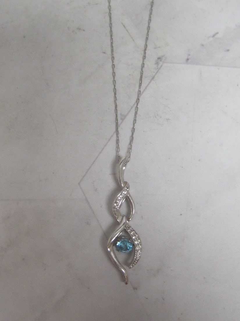Sterling Silver Pendant with Blue & CZ Stones on 20" Sterling Silver Chain: Weighs 2.3 grams