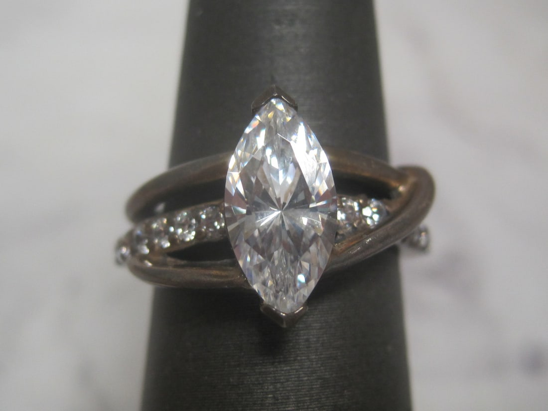 Sterling Silver CZ Ring: Weighs 4.9 grams, Size 6