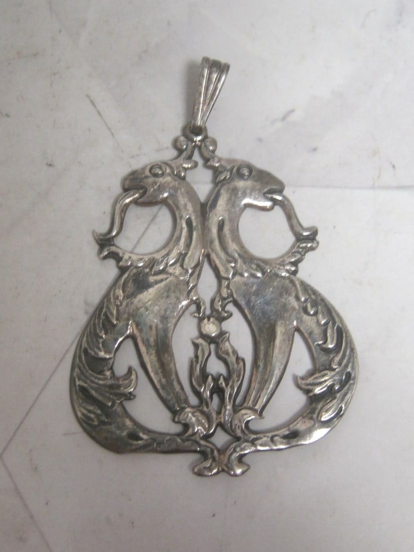 Sterling Silver Double Griffin Pendant: Weighs 8.9 grams
