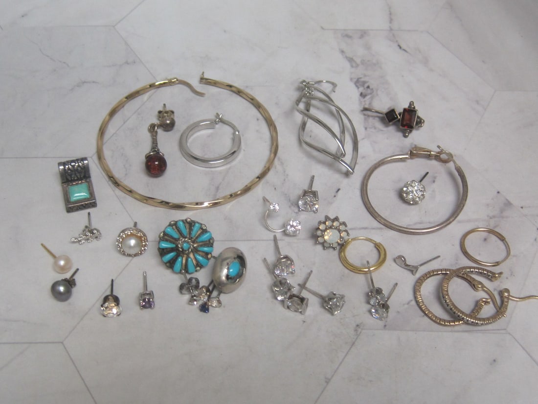 Large Lot of Sterling Silver Single Earrings: Weighs 33.4 grams