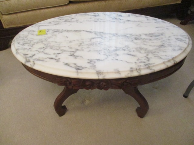 Oval Marble Parlor Table: Beautiful carvings; Heavy; 34" long x 23" wide x 17" tall