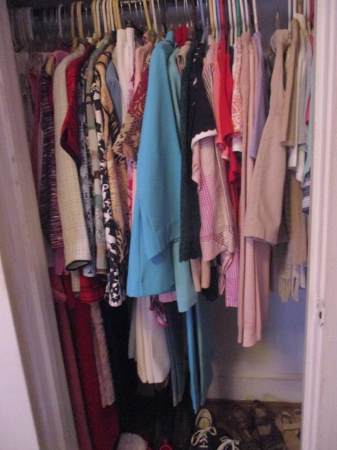 Bedroom Clothes Closet: Ladies (sizes 12 & 12 petites, small, medium); assorted shoes (size 8); belts Bring boxes