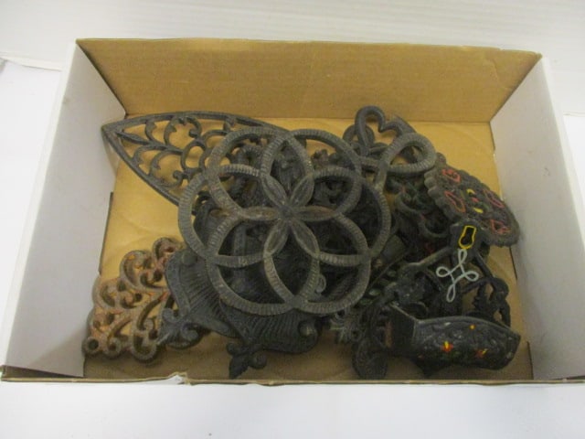 Iron Trivets (Lot of 9) & 1 Matchstick Holder: .
