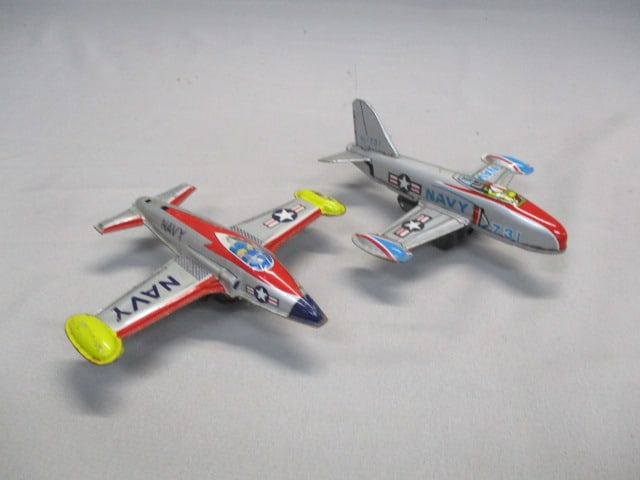 2 Vintage Tin Litho Toy Airplanes: .
