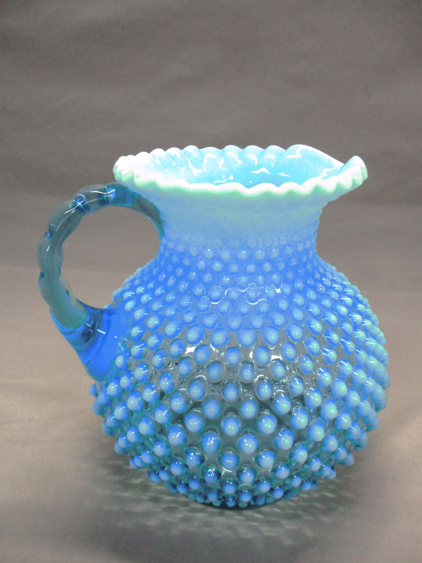 Fenton Blue Opalescent Hobnail Pitcher w/Crimped Rim: 8"