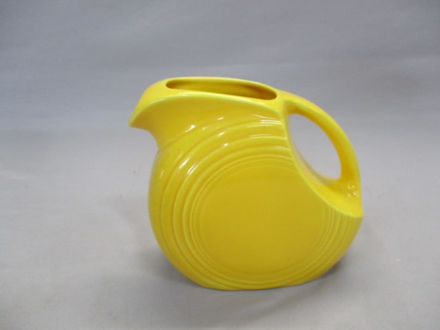 Fiesta Yellow Glaze Disk Pitcher 6^: .