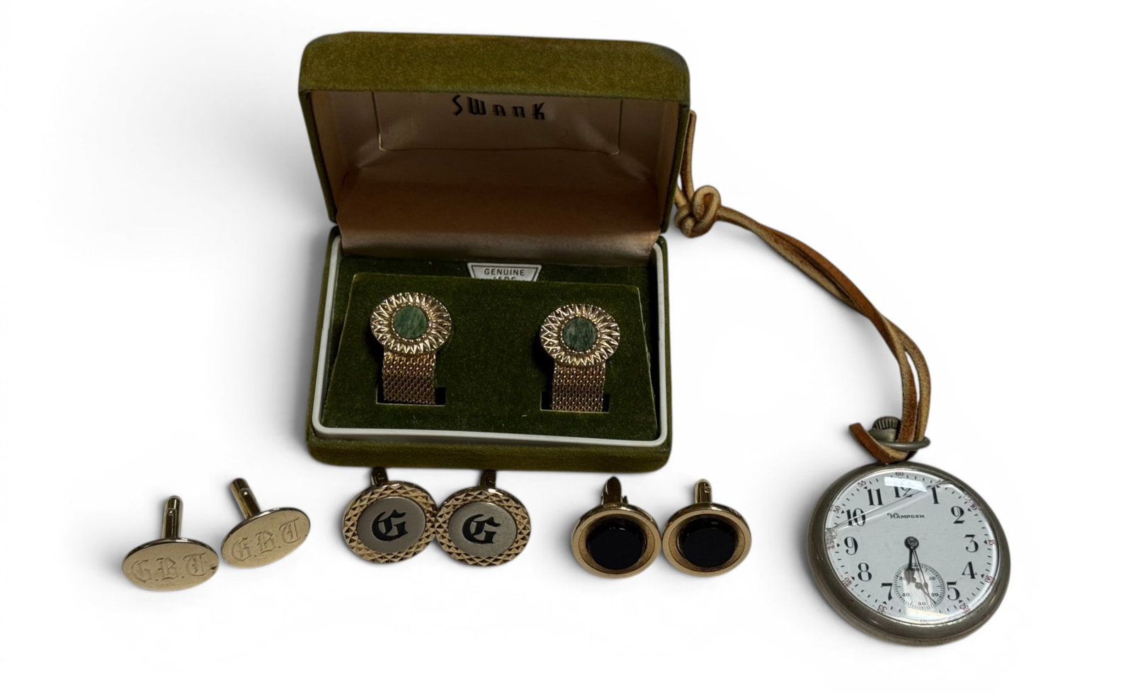 Swank Genuine Jade Cuff Links and 3 other pair of cuff links, also includes Pocket Watch: Hampden Pocket Watch ( see photos) does tick. Crystal is cracked.