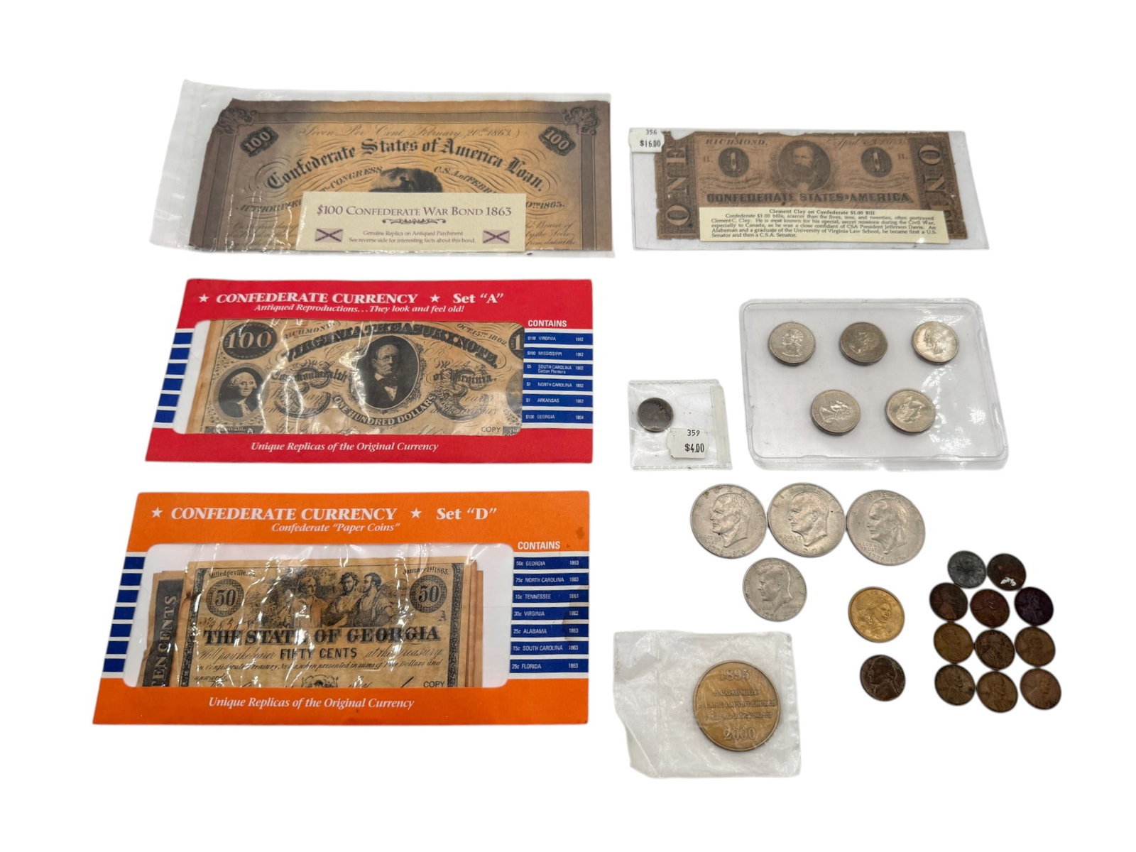 Lot of Collectible Coins and Currency: See photos here. A lot of the paper currency is replicas.