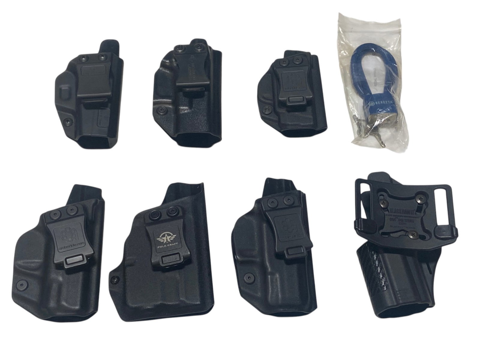 (7) Plastic Gun Holsters and Gun Lock: See photos for what’s all here