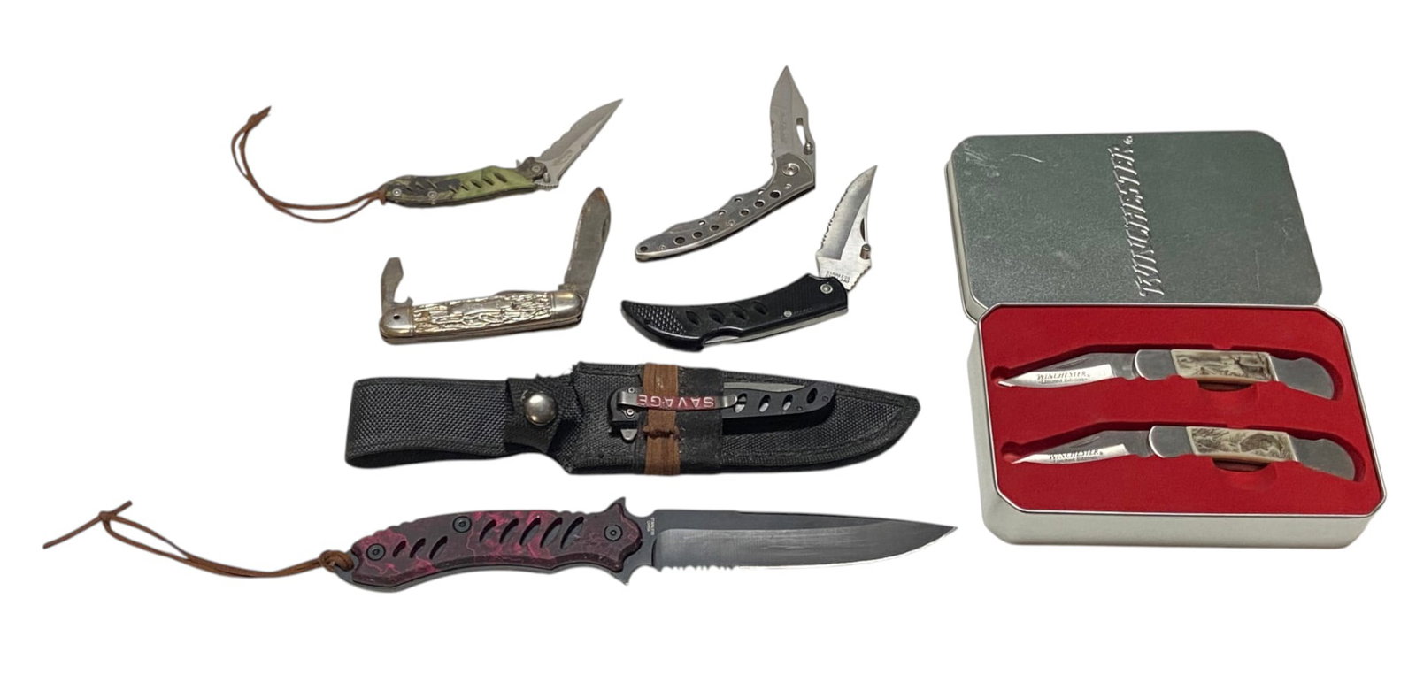 (6) knife lot: Winchester Collector Knife Set, Savage, Remington, Kamp King, and more. See photos.