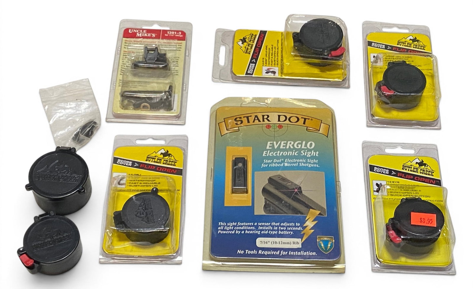 (5) Butler Creek Lens Covers, NIB Uncle Mike’s QD Swivels, NIB Star Dot Electronic Sight: See photos for what’s all here. (4) NIB Butler Creek, one Butler Creek out of package, (1) NIB Uncle Mike’s QD Swivels, Star Dot Everglo electronic sight