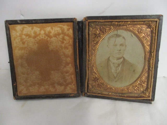Antique Portrait of Gentlemen in Tooled Leather Case: age wear on case and photo has a crease