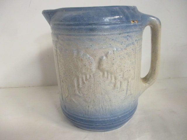 Vintage Salt Glaze Stoneware Pitcher with Tree Line Road in Relief: 7 3/4"h, two spots on pitting on shoulder