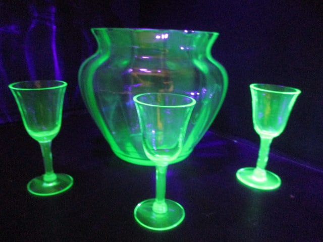 Green Uranium/Vaseline Ribbed Design Vase and Three Cordials: Vase 5"h, Cordials 3 1/2"h(one has chip on foot)