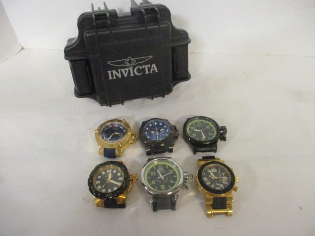 Six Invicta Watch Cases and a Invicta Black Hard Plastic Watch Box: Watches do not have bands, working condition unknown