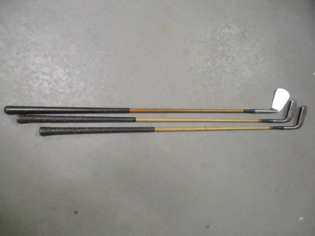 Three Vintage Wood Shaft Golf Club Irons: Left hand #6 Ratchart Nicholls BTN, Right hand #4 JC Higgens Johnny Bulla Model 47T and Right #5 Turf Cutter