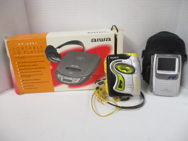 Aiwa XP-C507 Portable CD Player, Casio Ti-STN LCD Color Television TV-890 and: Sony WM-FS111 FM/AM Sports Walkman. All untested