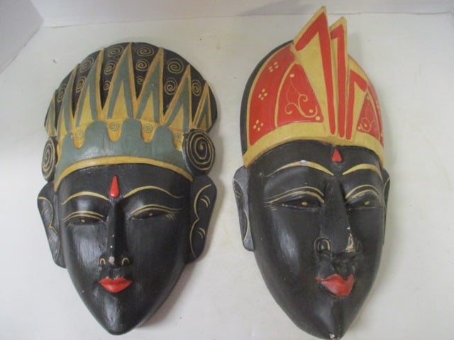 Two Painted and Carved Wooden Tribal Masks: 13"h, 14"h, some finish chips