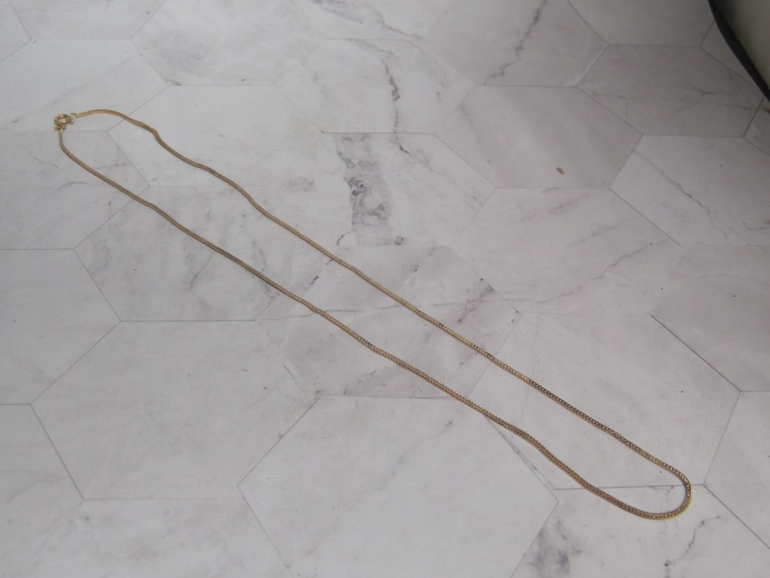 24" 18k Gold Chain: Weighs 7.2 grams