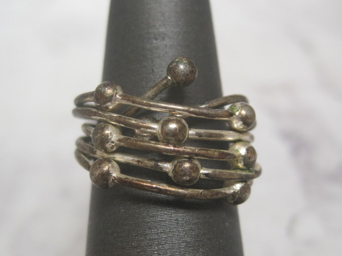 Sterling Silver Ring: Weighs 4 grams, Size 7