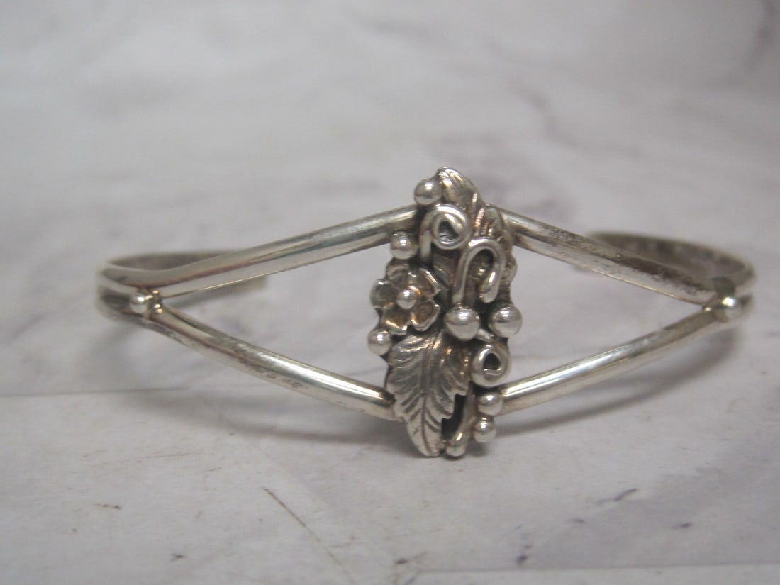 Sterling Silver Cuff Bracelet: Weighs 11 grams