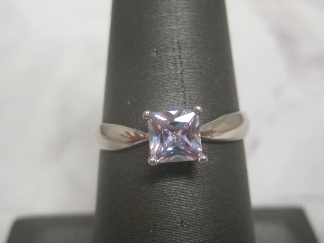Sterling Silver Ring with Light Purple Stone: Weighs 1.7 grams, Size 7 1/4