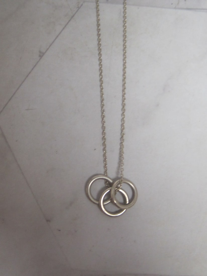 18" Sterling Silver Chain with "3 Ring" Pendant: Weighs 1.6 grams