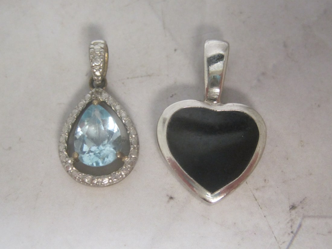 Sterling Silver Onyx Heart Pendant & Sterling Silver Blue Topaz Pendant: Weighs 3.4 grams