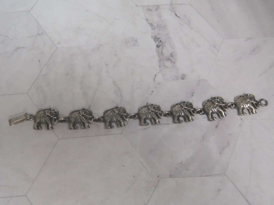 7 1/4" Sterling Silver Elephant Link Bracelet: Weighs 25.9 grams