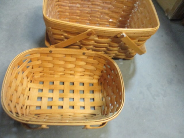 2 Longaberger 2-Handle Baskets - Signed and Dated: one has plastic insert