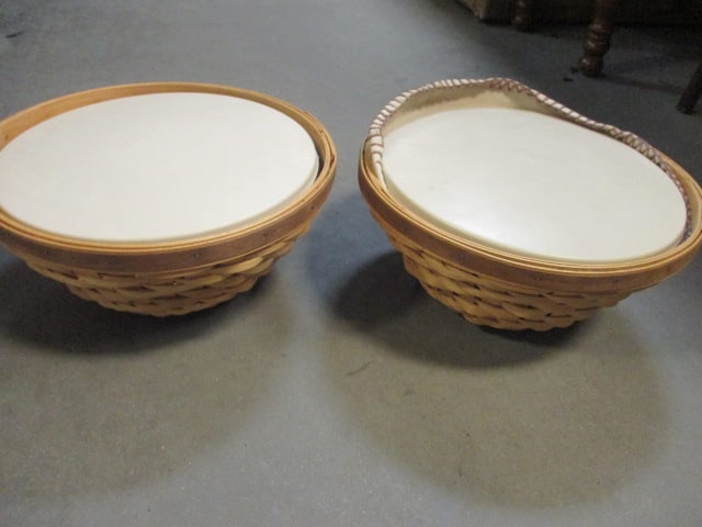 2 Longaberger Collector's Club Round Baskets with Plastic Lidded Bowls: 11 1/4" x 6 1/2" each, one has fabric insert, signed and dated